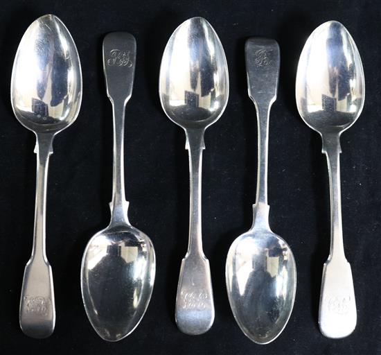 Five assorted 19th century silver fiddle pattern dessert spoons, 8.5 oz.